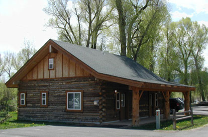 Photos Page or Gallery, Outside view of wood cabin